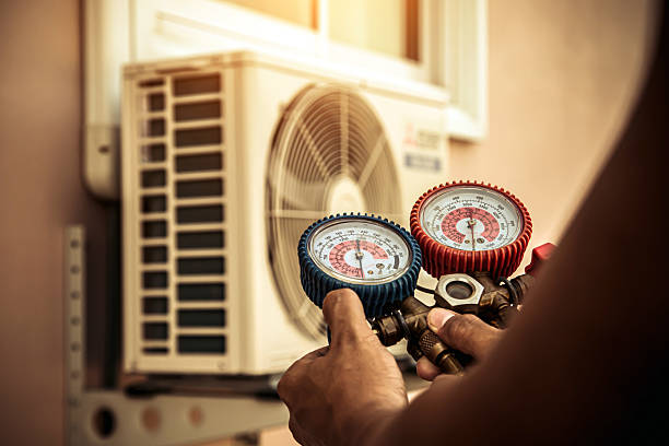 Professional Air Conditioning Service technician working in Excelsior, MN